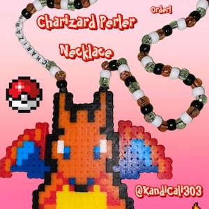 May include: Charizard Perler bead necklace with a red, orange, yellow, and blue pixelated Charizard design. The necklace is made with black, white, green, and orange beads. The text "Charizard Perler Necklace" is written in white letters on a brown background. The text "Free Gift W/ Every Order!" is written in white letters on a brown background. The text "@Kandicali303" is written in white letters on a black background.