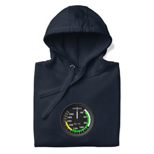 May include: A navy blue hoodie with a black and white airspeed indicator graphic on the front. The indicator has a green, yellow, and red arc with the text "AIRSPEED" and "KN ITS" printed on it.