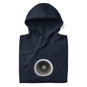 May include: A navy blue hoodie with a large, detailed image of a jet engine on the front.