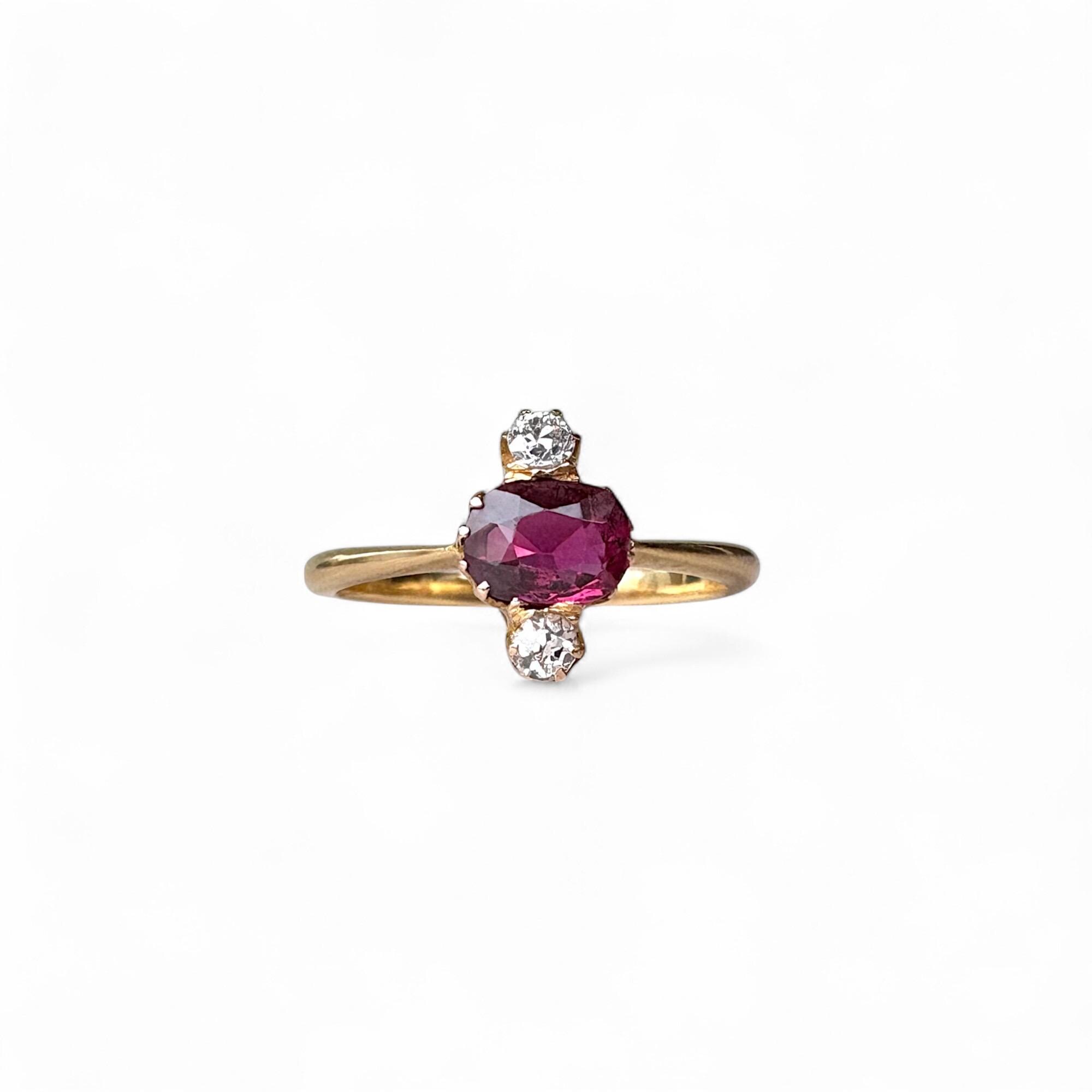 Vintage richly hued ruby and sparkly diamond 18K solid gold ring in an eye catching north-south vertical setting.