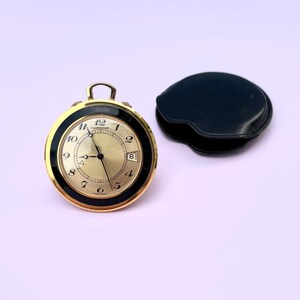 Vintage Jaeger-LeCoultre Memovox gold and black pocket  Kick-stand to place clock on night Black leather