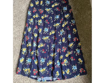 Falda midi plisada vintage azul marino con estampado floral - Mujer