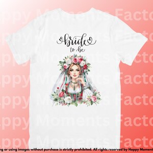 May include: White t-shirt with the text "bride to be" in black script. A watercolor illustration of a woman wearing a white veil and floral crown is centered on the shirt.