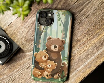 May include: A phone case featuring a cartoon illustration of a brown bear and two cubs in a woodland setting. The case has a camera cutout and a green, brown and white colour scheme.