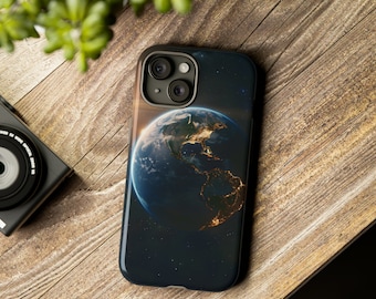 May include: A black phone case featuring a photograph of Earth as seen from space. The image shows the continents and oceans, with city lights visible at night.