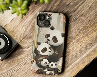 May include: A phone case with a panda family design. The image shows a parent panda hugging two cubs, with a background of bamboo and autumnal foliage. The case is displayed on a wooden surface.