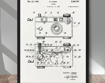 May include: A black and white line drawing of a camera patent, showing a side view of the camera with numbered parts. The patent is titled "Camera" and was filed on 6 December 1939, by Gustave Fassin. The patent number is 2,298,787.