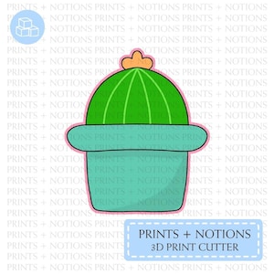 May include: A 3D printable design for a cactus in a pot. The cactus is green with a light green pot and a pink rim. The design is for a cookie cutter.