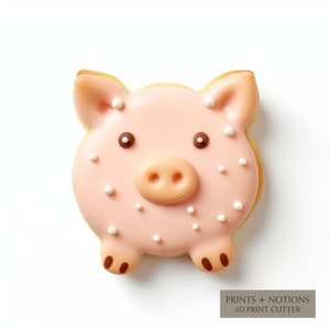 May include: A pink pig cookie decorated with white sprinkles and brown eyes. The cookie is on a white background.