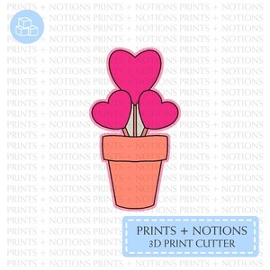 May include: A 3D printable design for a cookie cutter shaped like a potted plant with three pink hearts on stems. The text "PRINTS + NOTIONS 3D PRINT CUTTER" is at the bottom of the image.