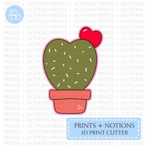 May include: A green heart-shaped cactus with white dots and a red heart on top. The cactus is in a red pot with a black outline. The image includes the text "PRINTS + NOTIONS 3D PRINT CUTTER".