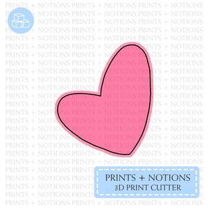 May include: A pink heart-shaped 3D print cutter with a black outline. The cutter is designed for use with a 3D printer and is labeled "PRINTS + NOTIONS 3D PRINT CUTTER".