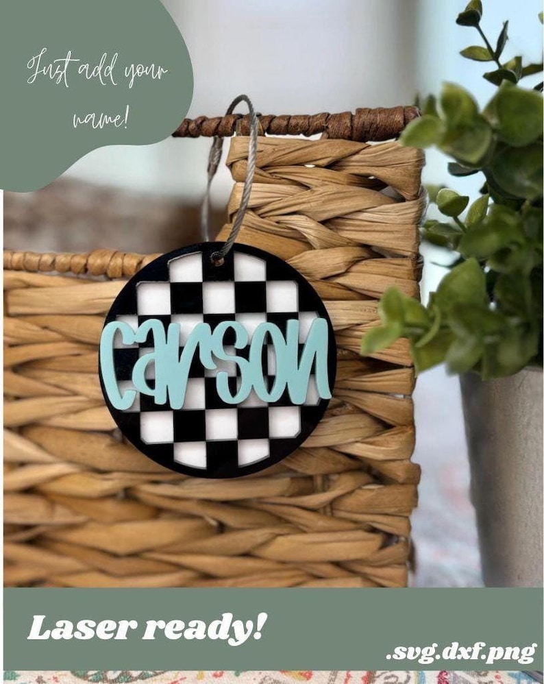 May include: A round, black and white checkered ornament with the name "CAYSON" in teal blue lettering. The ornament is laser cut and ready to be personalized.