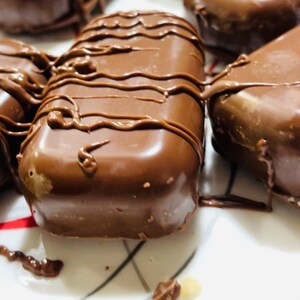 Carmel and vanilla cake filled chocolate truffles