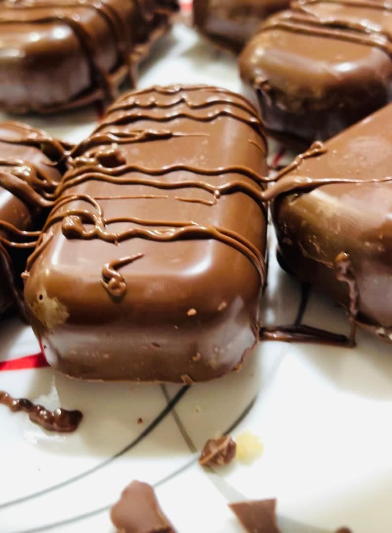 Carmel and vanilla cake filled chocolate truffles