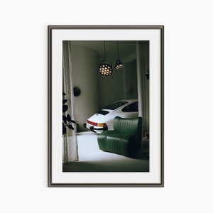 a picture of a living room with a green chair