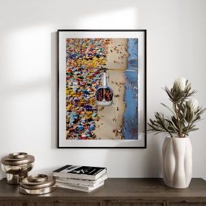 a picture of a beach with people on it