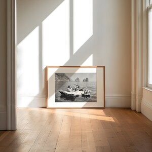 a picture frame sitting on top of a hard wood floor