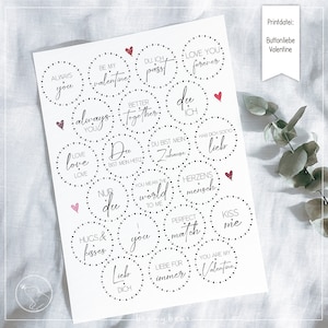 May include: A printable sheet of 16 Valentine's Day themed stickers with black and white text and red hearts. The text includes phrases like "Love you forever", "You are my Valentine", "Du bist mein Zuhause", and "Perfect match".