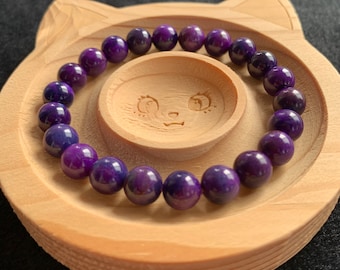 Auction jewelry Royal purple sugilite bracelet high jewry blue purple gel beads.