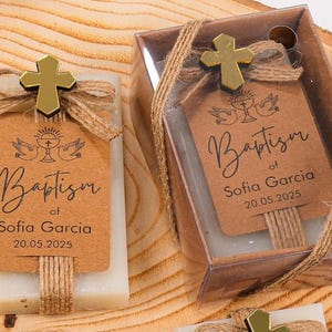 These beautiful handmade scented soap favors are a thoughtful gift for your special occasion. Ideal for baptisms, confirmations, christenings, first holy communions, quinceanera, sweet 16 or religious celebrations, each soap comes with a kraft paper tag customized with your guest of honor’s name, event date, and a personal message.

Each favor is topped with a rustic jute twine bow and a delicate charm, creating a charming and elegant presentation. Soaps are available in various scent-colors.