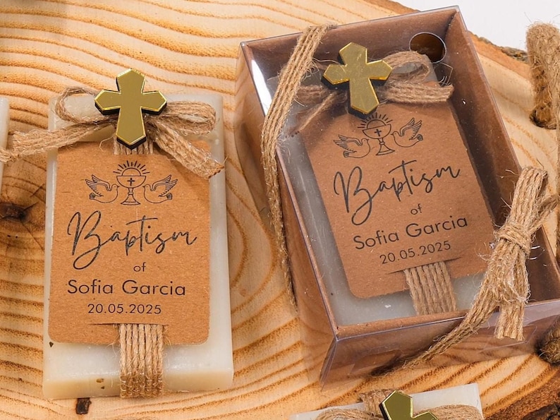 These beautiful handmade scented soap favors are a thoughtful gift for your special occasion. Ideal for baptisms, confirmations, christenings, first holy communions, quinceanera, sweet 16 or religious celebrations, each soap comes with a kraft paper tag customized with your guest of honor’s name, event date, and a personal message.

Each favor is topped with a rustic jute twine bow and a delicate charm, creating a charming and elegant presentation. Soaps are available in various scent-colors.