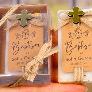 These beautiful handmade scented soap favors are a thoughtful gift for your special occasion. Ideal for baptisms, confirmations, christenings, first holy communions, quinceanera, sweet 16 or religious celebrations, each soap comes with a kraft paper tag customized with your guest of honor’s name, event date, and a personal message.

Each favor is topped with a rustic jute twine bow and a delicate charm, creating a charming and elegant presentation. Soaps are available in various scent-colors.