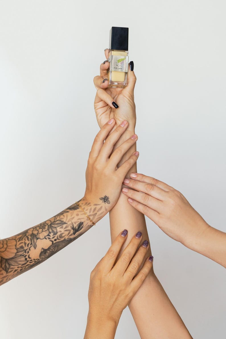 Hands holding vegan aloe vera serum, cruelty-free natural skincare