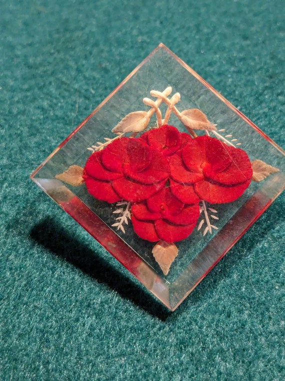 Lucite brooch pin with reverse carved red flowers - image 3