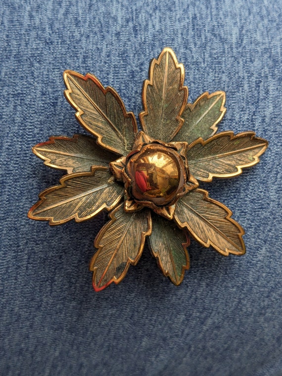 Copper flower signed brooch