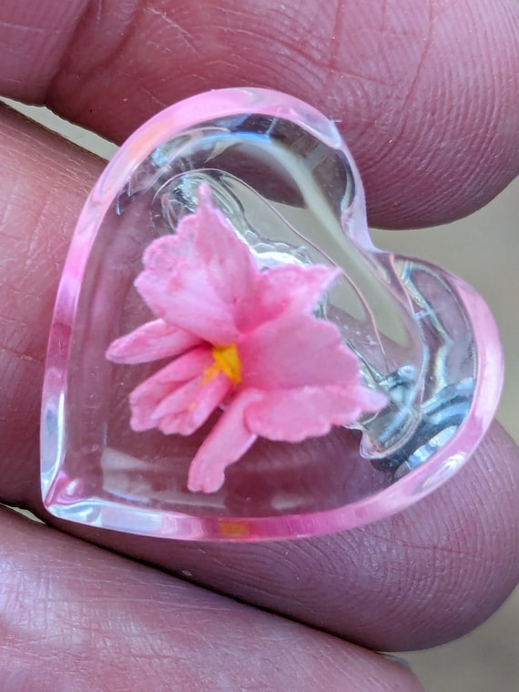 Heart shaped Lucite brooch pin with reverse carved