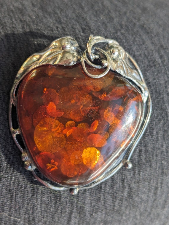 Amber and sterling silver brooch