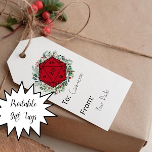 May include: Printable gift tag featuring a red and white dice illustration surrounded by green foliage. The tag reads "To: Cameron From: Your Pals".