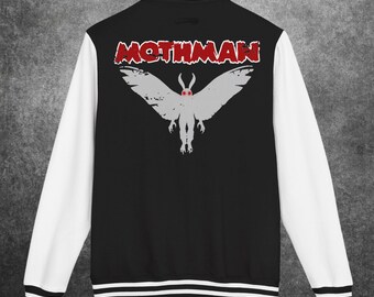 May include: Black varsity jacket with white sleeves and trim. The back displays a grey Mothman graphic with red eyes and the word "MOTHMAN" in red block letters. The jacket has a classic athletic style.