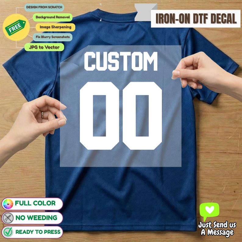 May include: A blue sports shirt with a white "CUSTOM 00" iron-on DTF decal. The image shows the decal being applied. Text indicates design services, including background removal and image sharpening. The decal is ready to press.