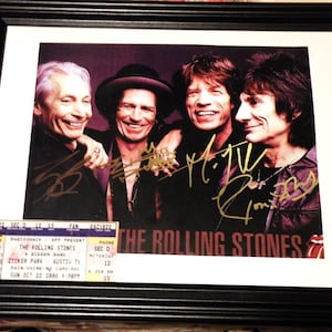 The Rolling Stones in a Quality Glass Frame, Reproduction, Autograph, Photo and ticket, Signed by the Legendary Rock Band