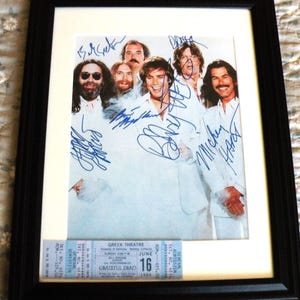 The Grateful Dead in a Quality Glass Frame, Iconic Reproduction Autographed, Photo and ticket Signed by the Legendary Rock band Collectible