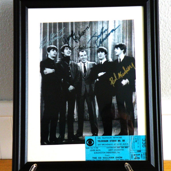 The Beatles Autograph in Quality Framed Photo and ticket Reproduction Signed by the Legendary Rock band Collectible