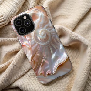 May include: A phone case with a pearly iridescent design featuring a spiral shell pattern. The case is made of a hard plastic material and has a matte finish.