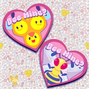 May include: Two heart-shaped stickers with a pink border and the text "Bee Mine?". One features a honeycomb design with smiling bees, the other a cartoon bee with red eyes and blue wings. The background is a floral pattern.