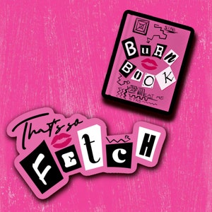 May include: Pink background with two stickers. The first sticker is a pink rectangle with black text that says "Burn Book" with a red lipstick mark. The second sticker is pink with black text that says "That's so Fetch".