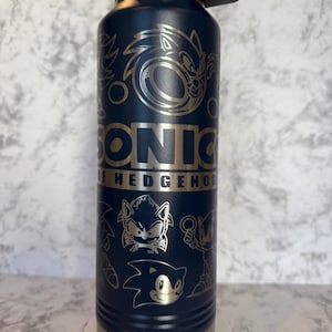 Sonic themed 40oz flip top tumbler with various color options and other tumbler styles