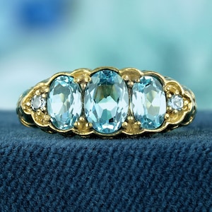 Natural Blue Topaz Vintage Style Carved Three Stone Ring in Solid 9K Yellow Gold