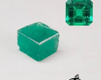 May include: Two emerald gemstones are displayed against a white background. One is a rough, uncut emerald cube, and the other is a square-cut emerald. The gemstones are a vibrant green color. The logo "GEMTASY" is at the bottom.