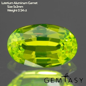 May include: A vibrant, oval-cut Lutetium Aluminum Garnet gemstone. The gem is a bright, translucent lime green color. The text in the image reads: Lutetium Aluminum Garnet, Size 5x3mm, Weight 0.54 ct.