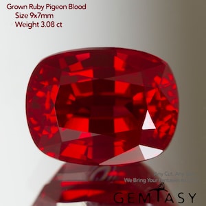 May include: A cushion-cut lab-grown pigeon blood ruby gemstone with a deep red color and faceted surface. Text on the image reads: Grown Ruby Pigeon Blood, Size 9x7mm, Weight 3.08 ct, Any Cut, Any Size, We Bring Your Fantasies to Life, GEMTASY.
