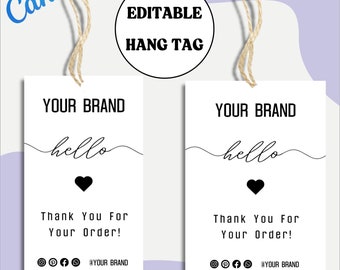 May include: Editable hang tag template with the text "YOUR BRAND" and "hello" in a handwritten font. The tag also includes a small black heart, the text "Thank You For Your Order!" and social media icons with the text "@YOUR BRAND".