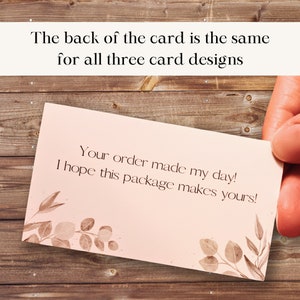 May include: A pink card with a floral design and the text "Your order made my day! I hope this package makes yours!" The back of the card is the same for all three card designs.