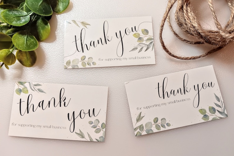 May include: Three white thank you cards with a green leafy design and the text "thank you for supporting my small business".