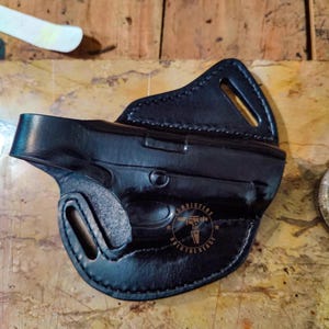 Custom Molded OWB Leather Holster with Reinforced Steel Thumb Break for Beretta, Sig Sauer and Walther Models.